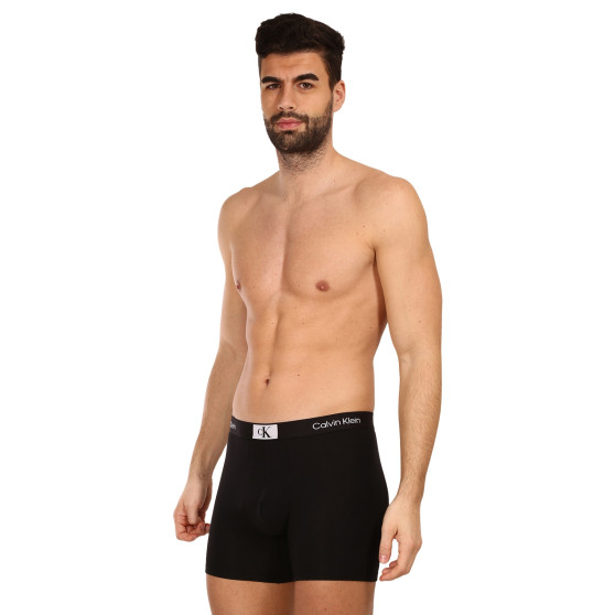 3PACK Boxershorts för herrar Calvin Klein svart (NB3529A-UB1)