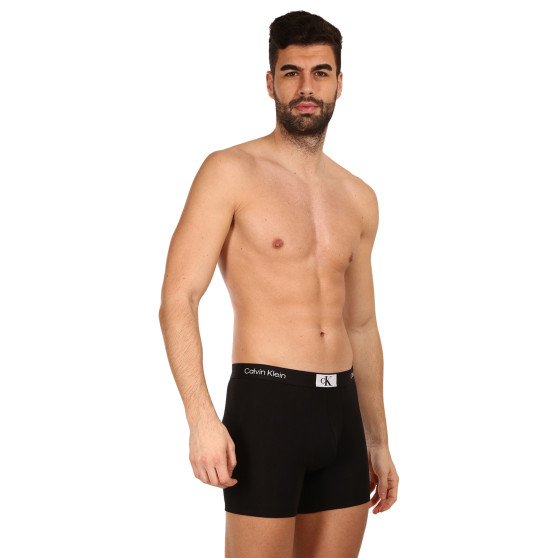 3PACK Boxershorts för herrar Calvin Klein svart (NB3529A-UB1)