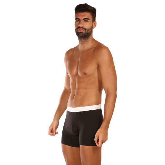 3PACK Boxershorts för herrar Calvin Klein svart (NB2971A-GZ5)