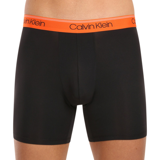 3PACK Boxershorts för herrar Calvin Klein svart (NB2570A-GTK)