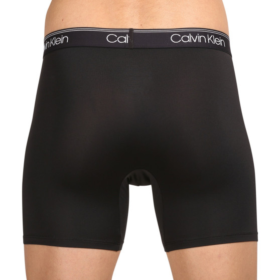 3PACK Boxershorts för herrar Calvin Klein svart (NB2570A-N2L)