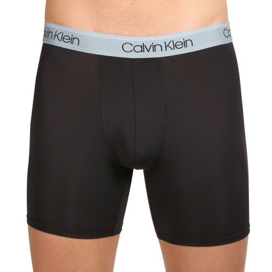 3PACK Boxershorts för herrar Calvin Klein svart (NB2570A-N2L)