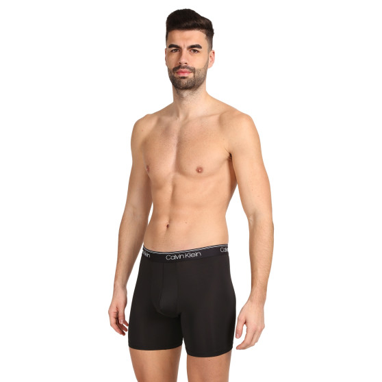 3PACK Boxershorts för herrar Calvin Klein svart (NB2570A-N2L)