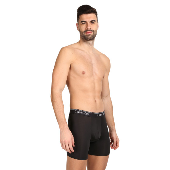 3PACK Boxershorts för herrar Calvin Klein svart (NB2570A-N2L)