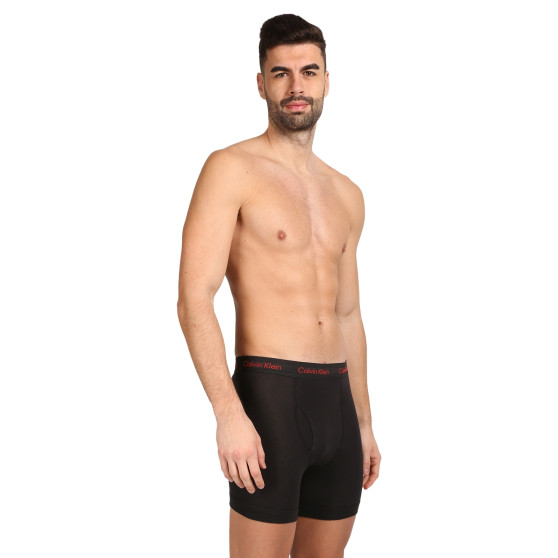 3PACK Boxershorts för herrar Calvin Klein svart (NB2616A-NC1)