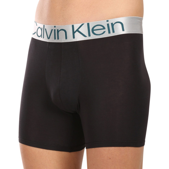 3PACK Boxershorts för herrar Calvin Klein svart (NB3131A-NC4)