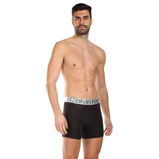 3PACK Boxershorts för herrar Calvin Klein svart (NB3131A-NC4)