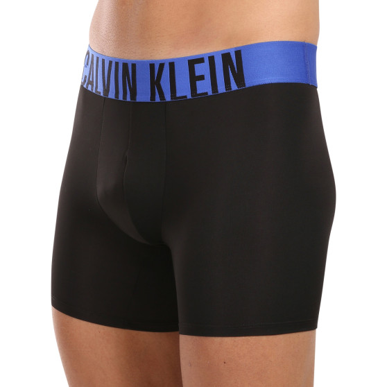 3PACK Boxershorts för herrar Calvin Klein svart (NB3612A-MDJ)