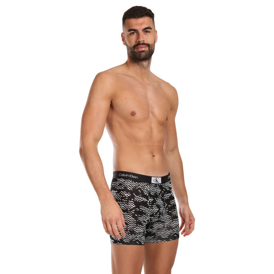 3PACK Boxershorts för herrar Calvin Klein multicolour (NB3529E-MRU)