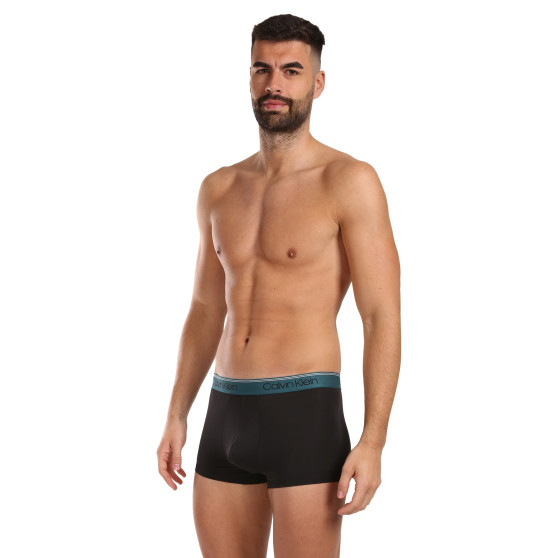 3PACK Boxershorts för herrar Calvin Klein svart (NB2569A-N2L)