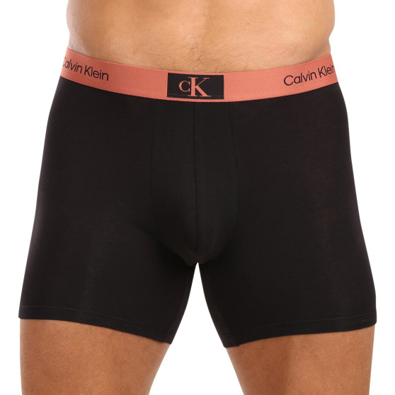 3PACK Boxershorts för herrar Calvin Klein svart (NB3529A-MTF)