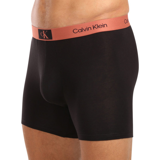 3PACK Boxershorts för herrar Calvin Klein svart (NB3529A-MTF)