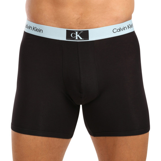 3PACK Boxershorts för herrar Calvin Klein svart (NB3529A-MTF)