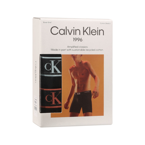 3PACK Boxershorts för herrar Calvin Klein svart (NB3529A-MTF)