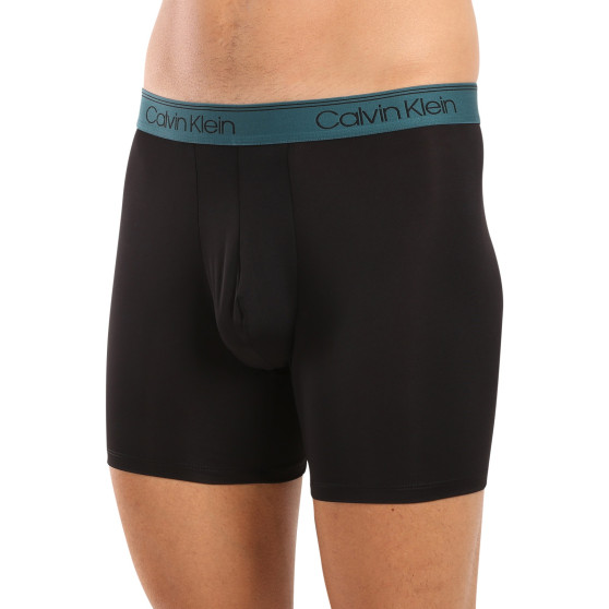 3PACK Boxershorts för herrar Calvin Klein svart (NB2570A-Q7E)