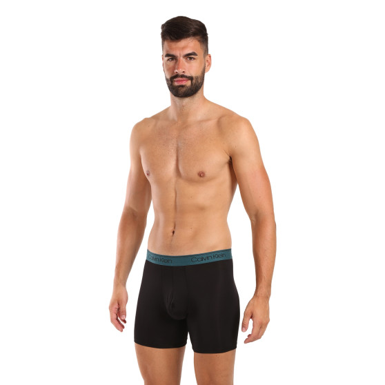 3PACK Boxershorts för herrar Calvin Klein svart (NB2570A-Q7E)