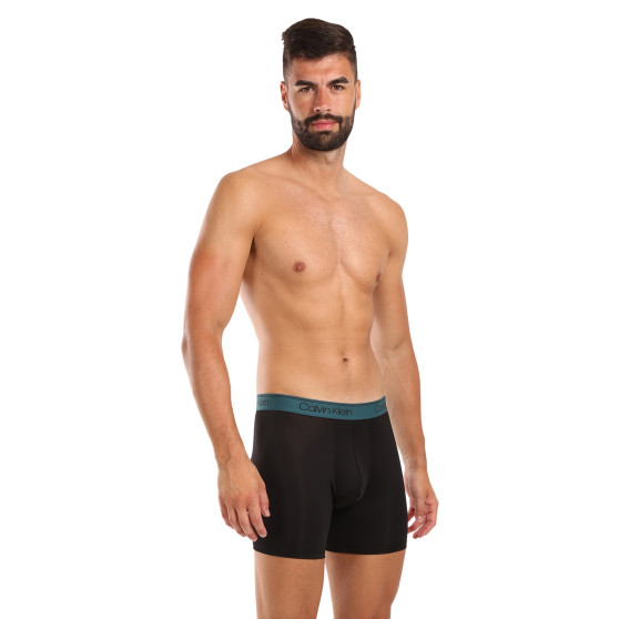 3PACK Boxershorts för herrar Calvin Klein svart (NB2570A-Q7E)