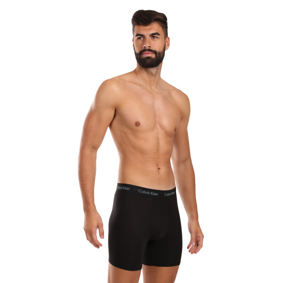 3PACK Boxershorts för herrar Calvin Klein svart (NB1770A-Q5F)