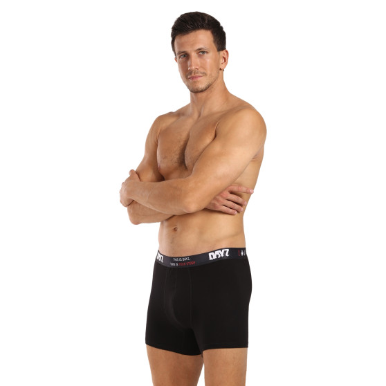 3PACK Boxershorts för herrar Calvin Klein svart (NB3612A-MDL)