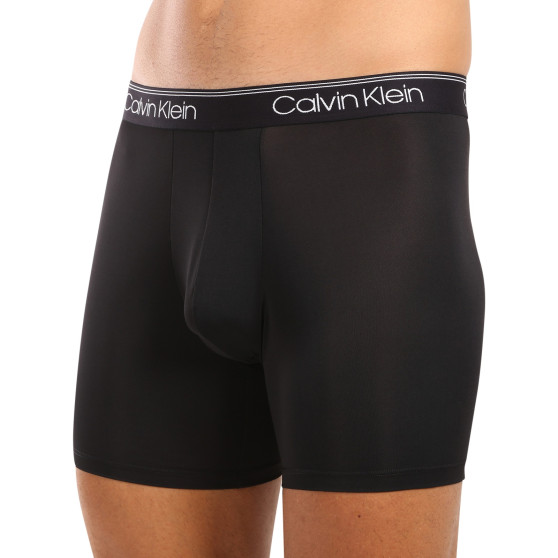 3PACK Boxershorts för herrar Calvin Klein svart (NB2570A-Q84)