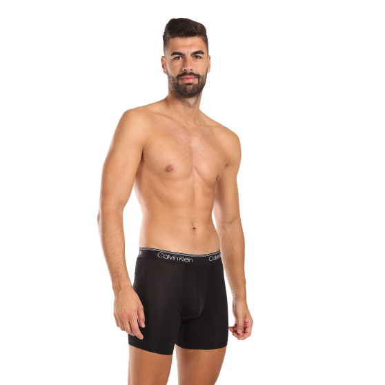 3PACK Boxershorts för herrar Calvin Klein svart (NB2570A-Q84)