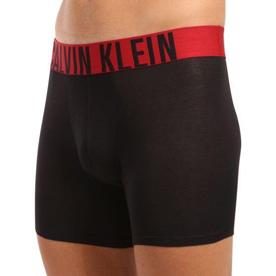 3PACK Boxershorts för herrar Calvin Klein svart (NB3609A-Q5W)