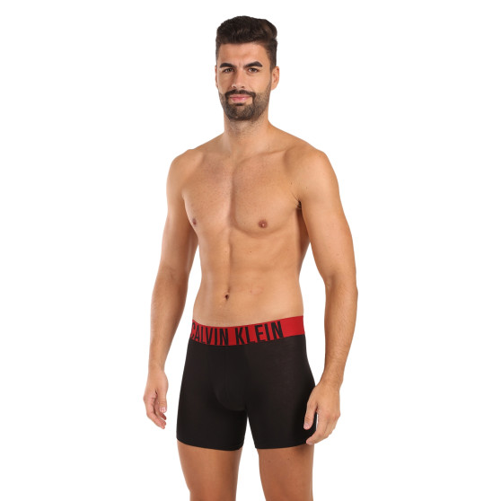 3PACK Boxershorts för herrar Calvin Klein svart (NB3609A-Q5W)